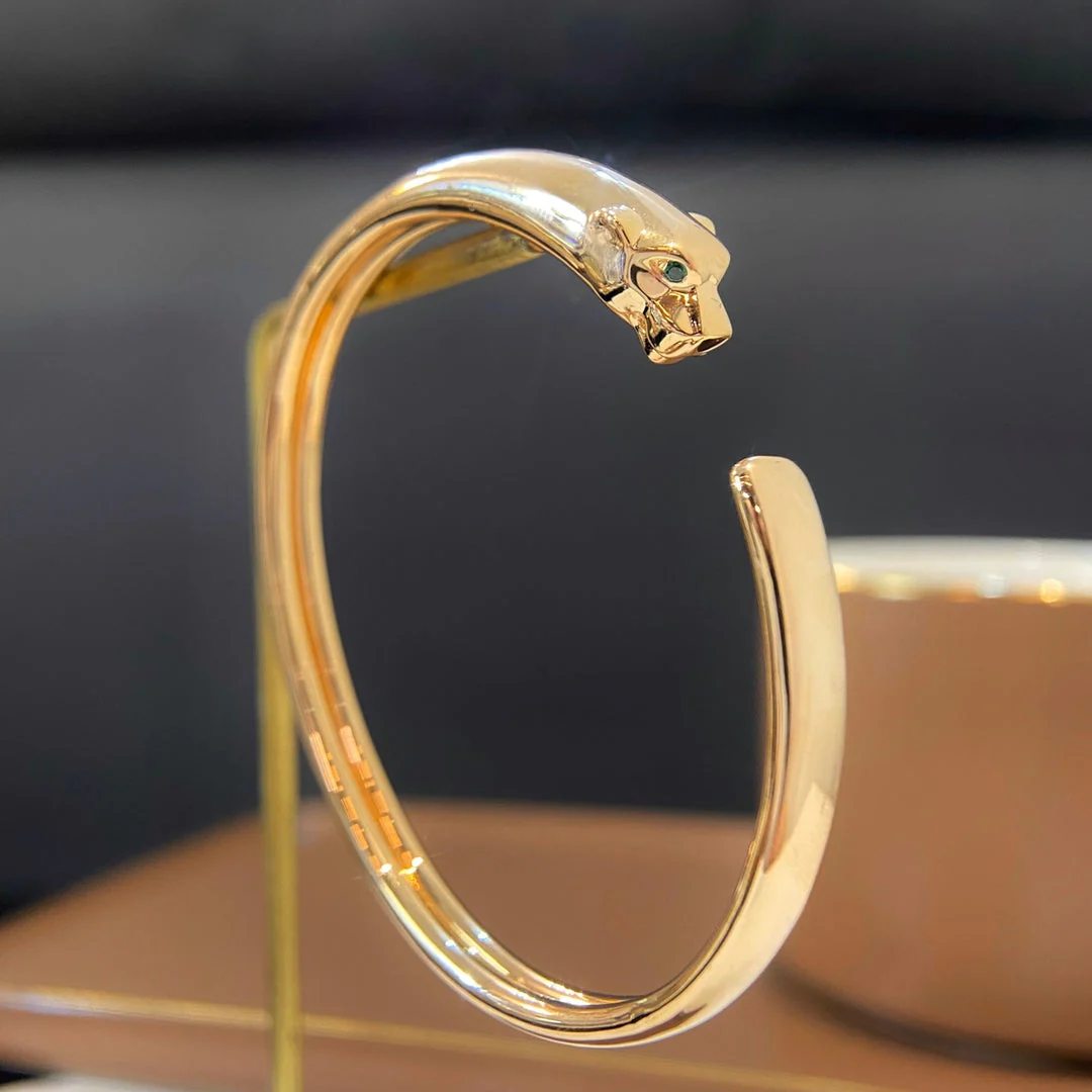 13298739014120439_4bac7687-c570-4d41-9a7c-2aa4f7897f49.webp PANTHERE GOLD DIAMOND OPEN BRACELET - 17 - Image 1