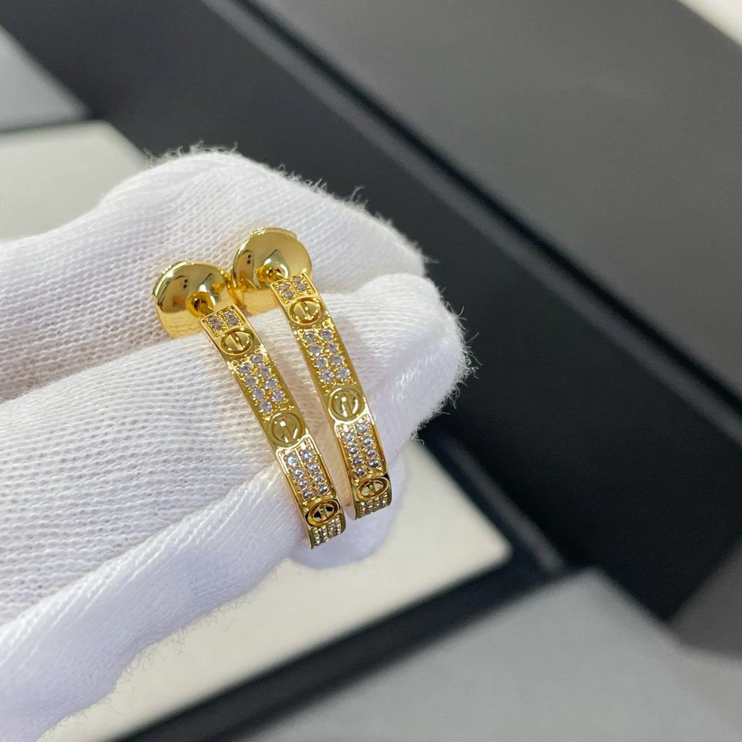 13338221994960958_63dcd926-ac08-40db-baa7-0f382e279c3f.webp LOVE DIAMOND GOLD HOOP EARRINGS - Image 1