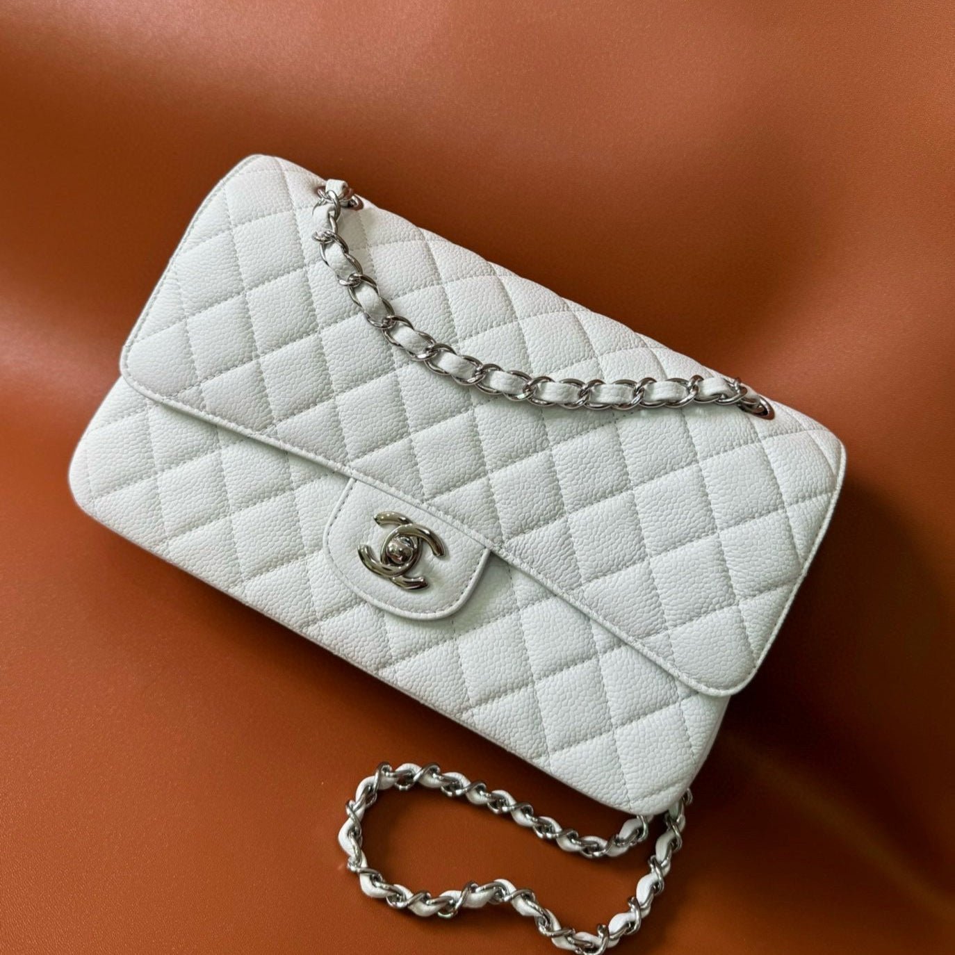 Image_20250114154744_5f45ac00-7cb0-4dee-9665-41a807d9869d FLAP BAG 25 IN WHITE CAVIAR LAMBSKIN SILVER HARDWARE - Image 1