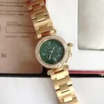 CARTIE PASHA 35MM QUARTZ GOLD CASE DIAMOND BEZEL BLUE DIAL - Image 14