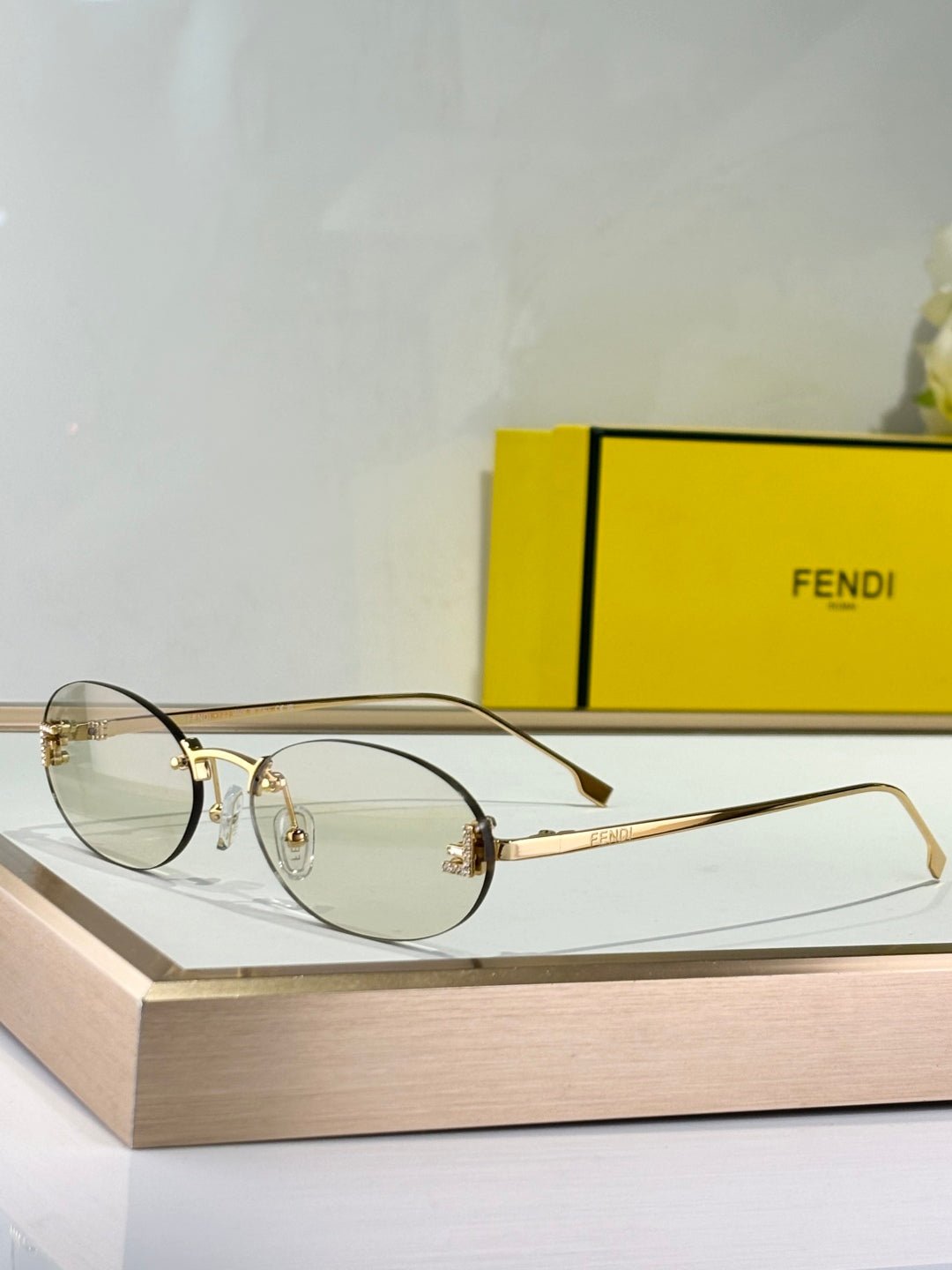 FIRST CRYSTAL RIMLESS OVAL FRAME SUNGLASSES FE4075US IN METAL - Image 13