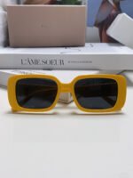 MONTAIGNE SUNGLASS 571593 IN YELLOW ACETATE TEXT LOGO - Image 16
